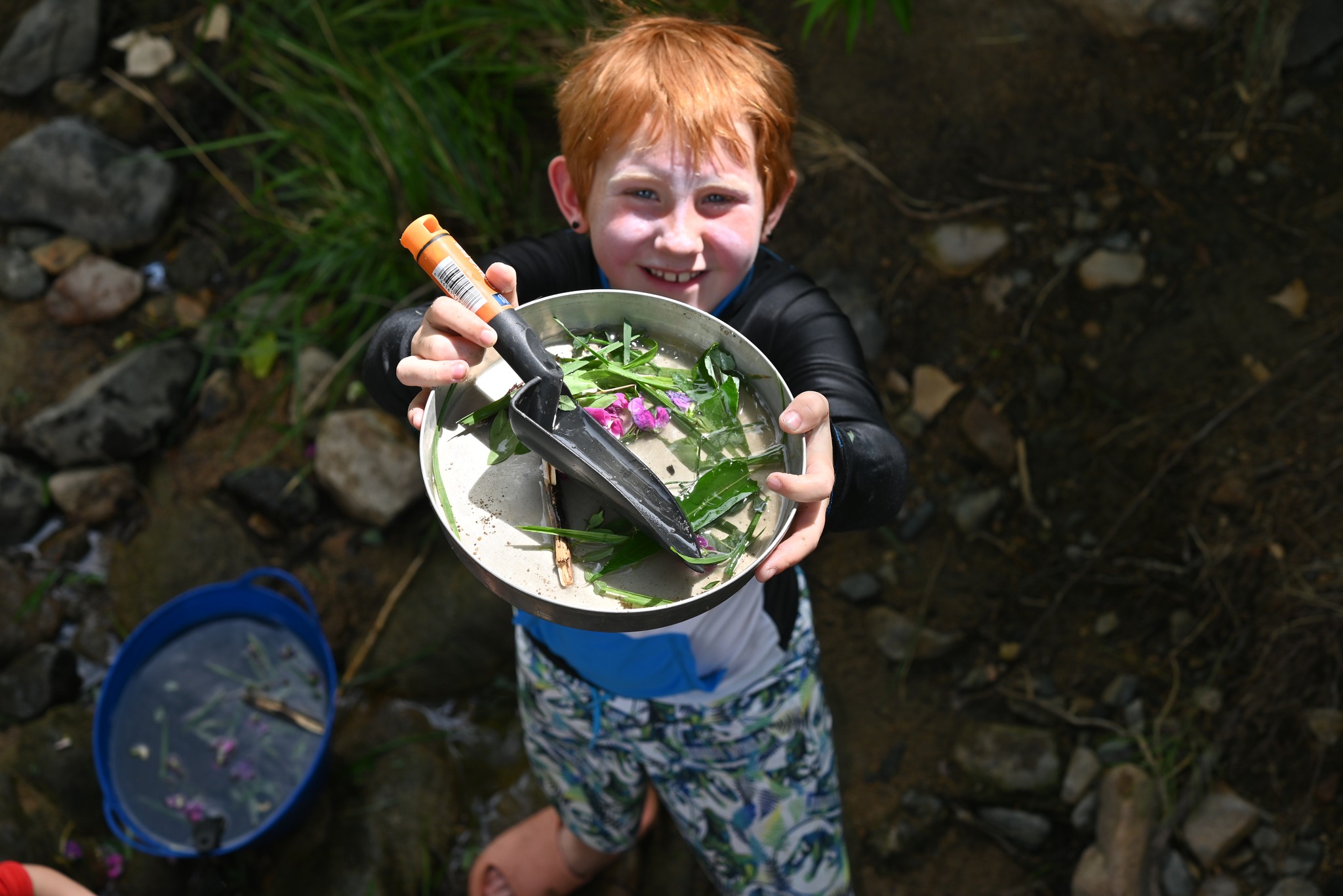child showing off nature potion